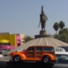 Woodie at Tijuana's statue of Cuauhtemoc, the last emperor of the Aztecs