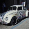 16 Woodie races Herbie
