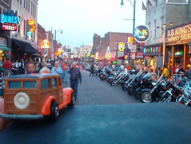 54 It was starting to get dark on Beale Street, happened to be bike night